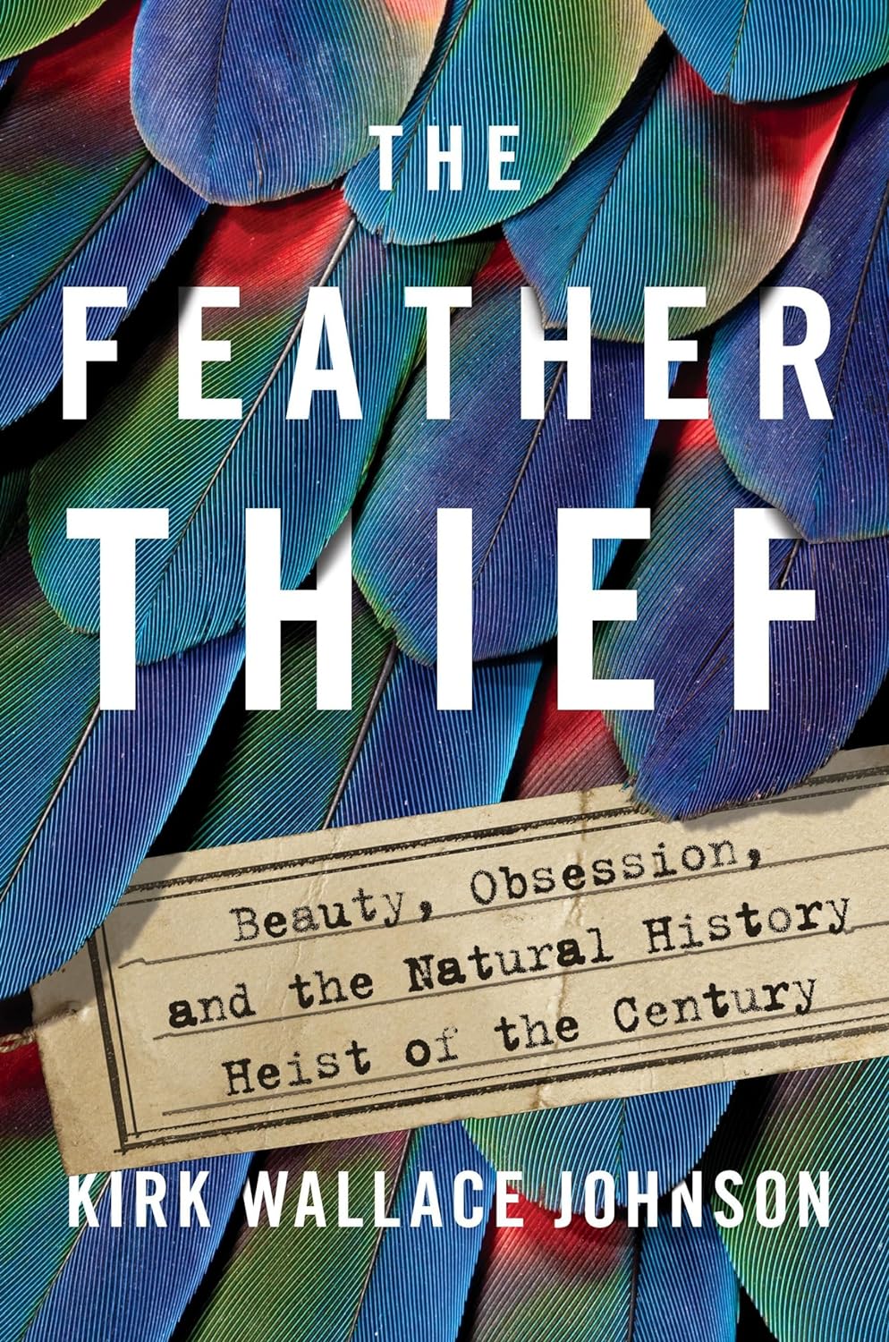 Front cover of the book The Feather Thief, which has large blue, green, and red feathers across the entire cover.
